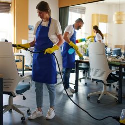 professional-cleaning-service-person-using-vacuum-cleaner-office_23-2150520631
